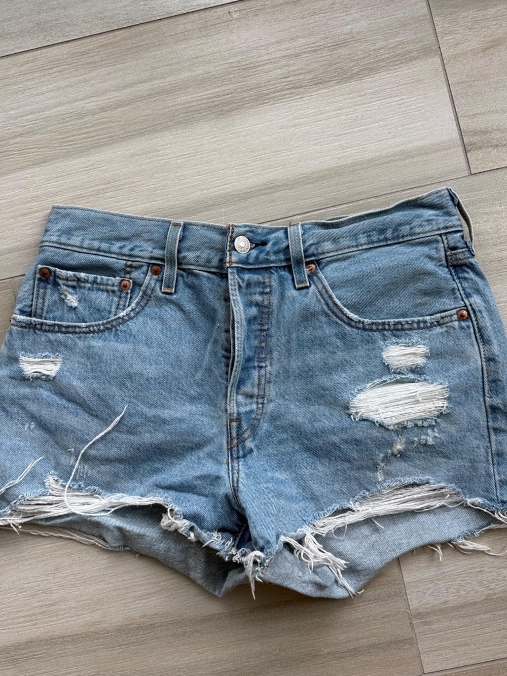 Levi's Light Blue Distressed High-Rise Jean Shorts
